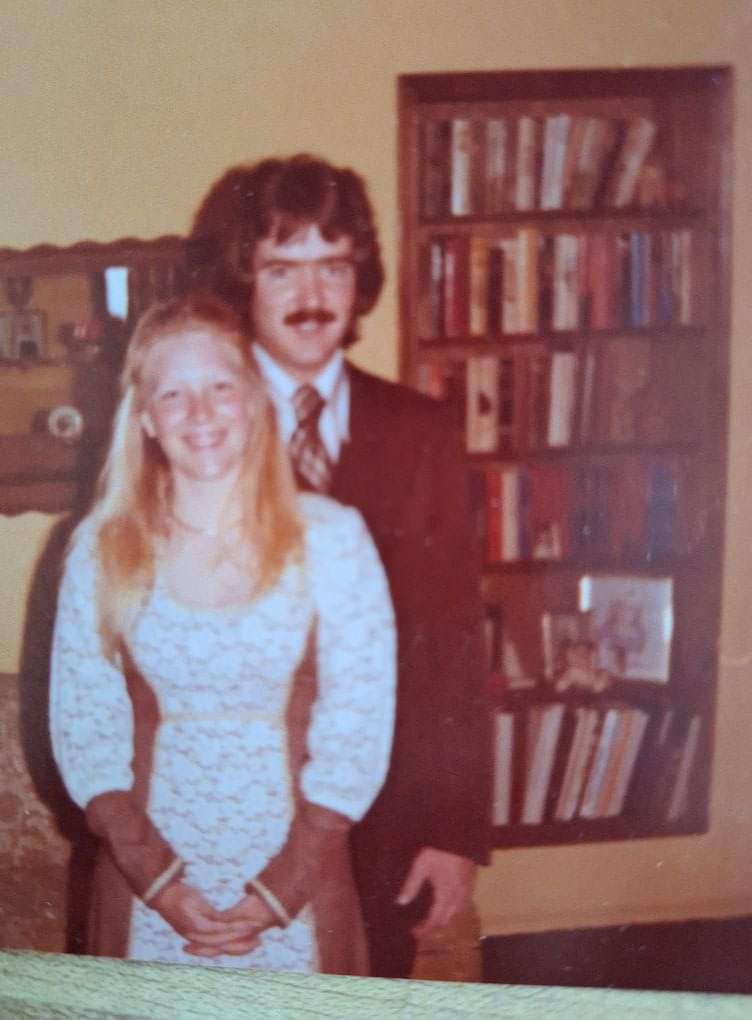 Damaged photo — before